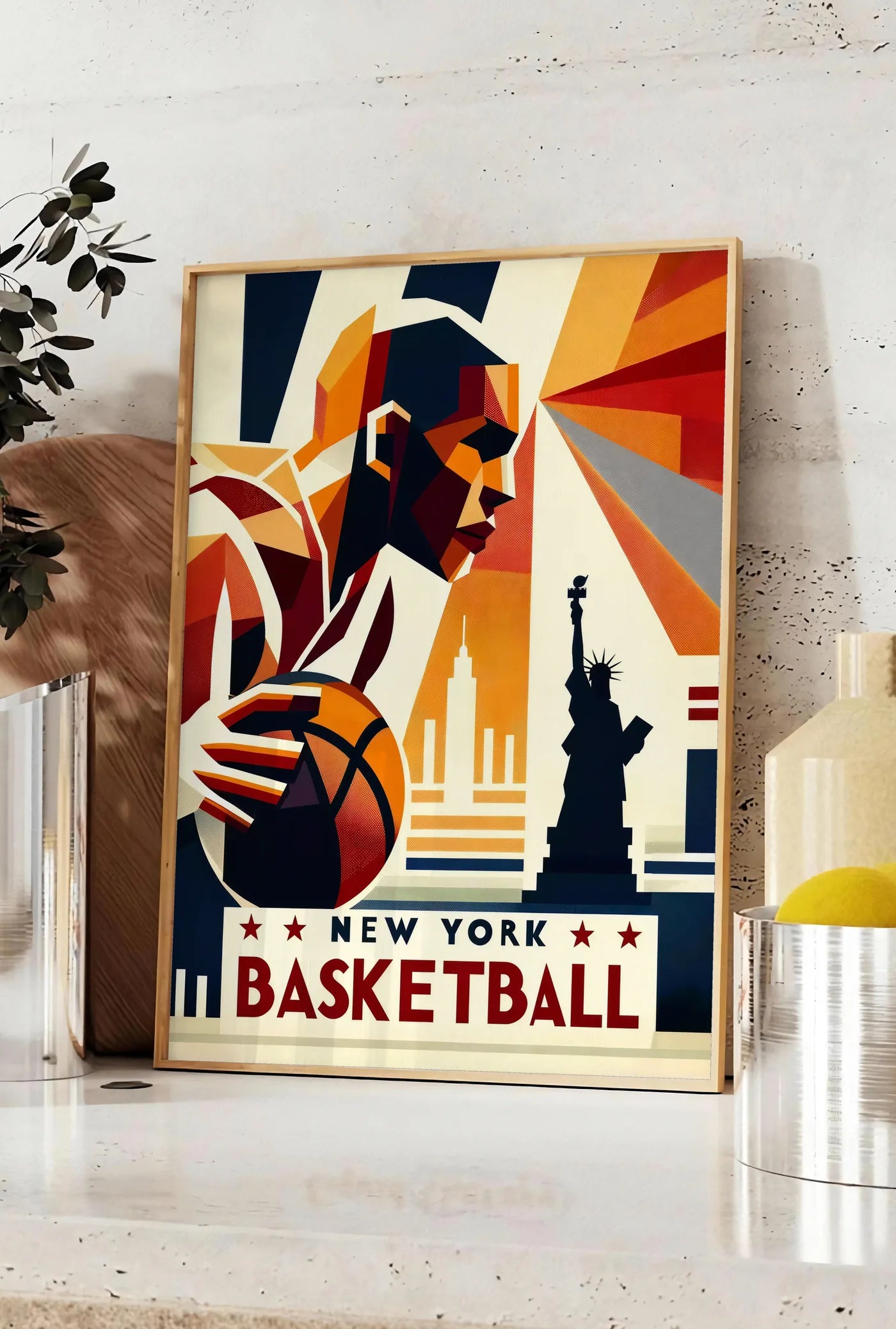 Affiche profil du joueur de basketball stylisé, posee sur un plan de travail de cuisine en pierre claire, entre une branche d'eucalyptus en vase et un bocal de citrons