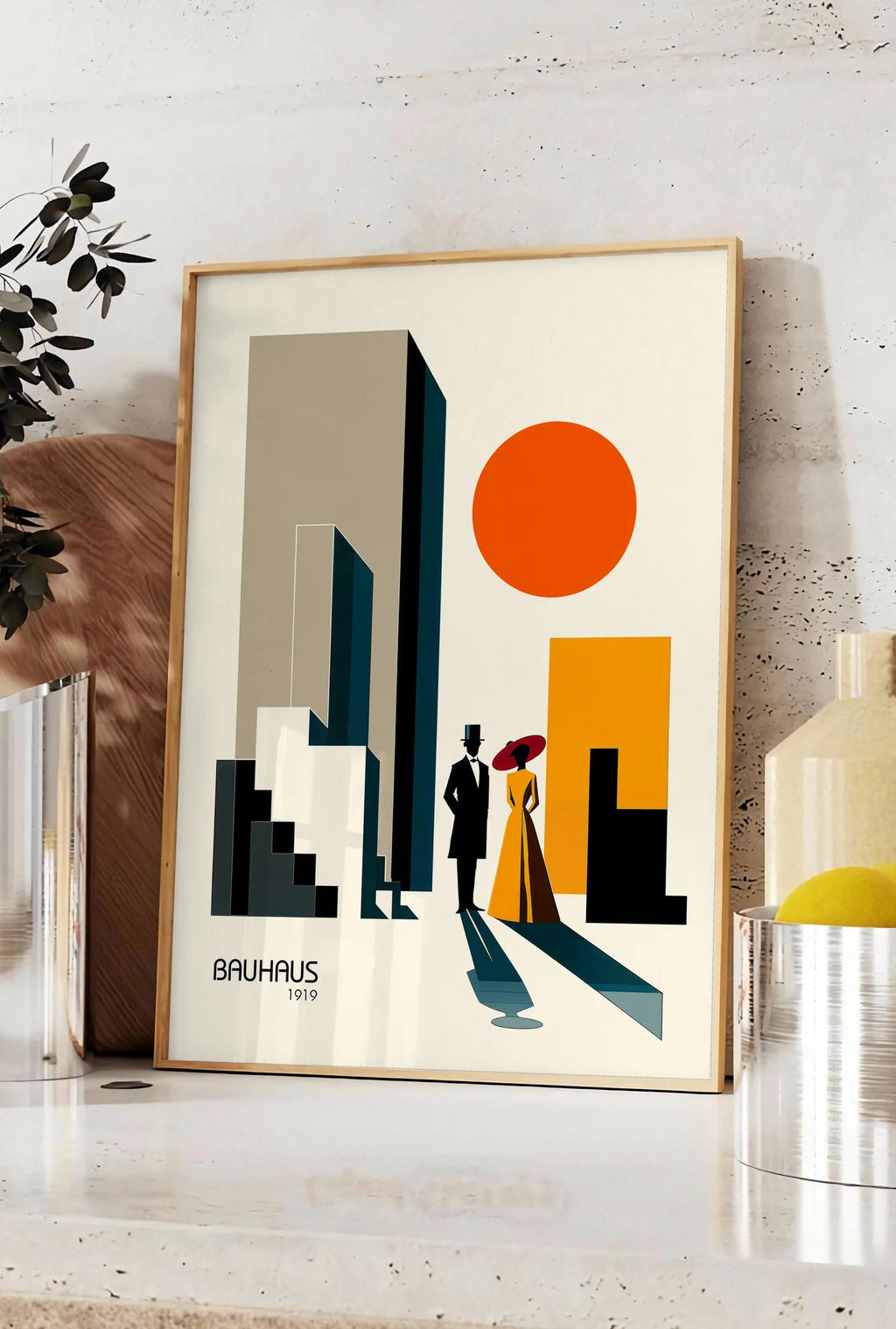Affiche couple en Ville, posee sur un plan de travail de cuisine en pierre claire, entre une branche d'eucalyptus en vase et un bocal de citrons