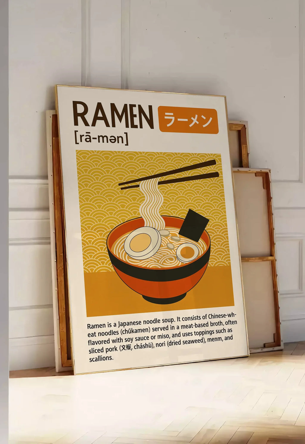 Tirage encadrable affiche ramen cuisine, posee au sol dans une entree lumineuse, contre un mur a panneaux blancs, a cote de chassis en bois empiles