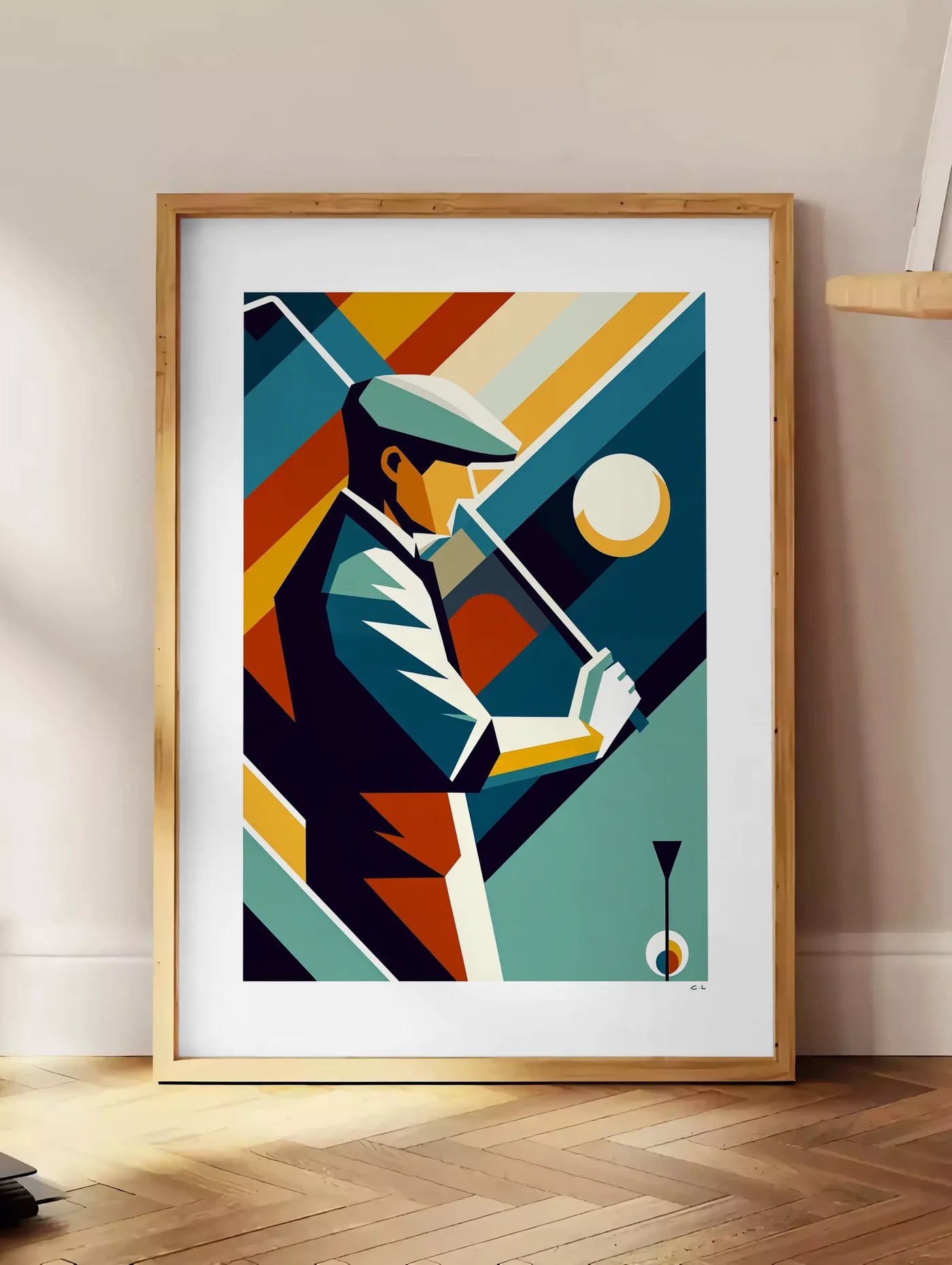 Estampe affiche golf cubiste Art Deco, posee au sol dans un coin salon, sur un parquet a chevrons, pres d'une table d'appoint en chene chargee de livres