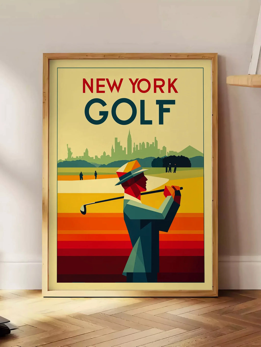 Estampe golfeur géométrique en aplats d ocre jaune, posee au sol dans un coin salon, sur un parquet a chevrons, pres d'une table d'appoint en chene chargee de livres