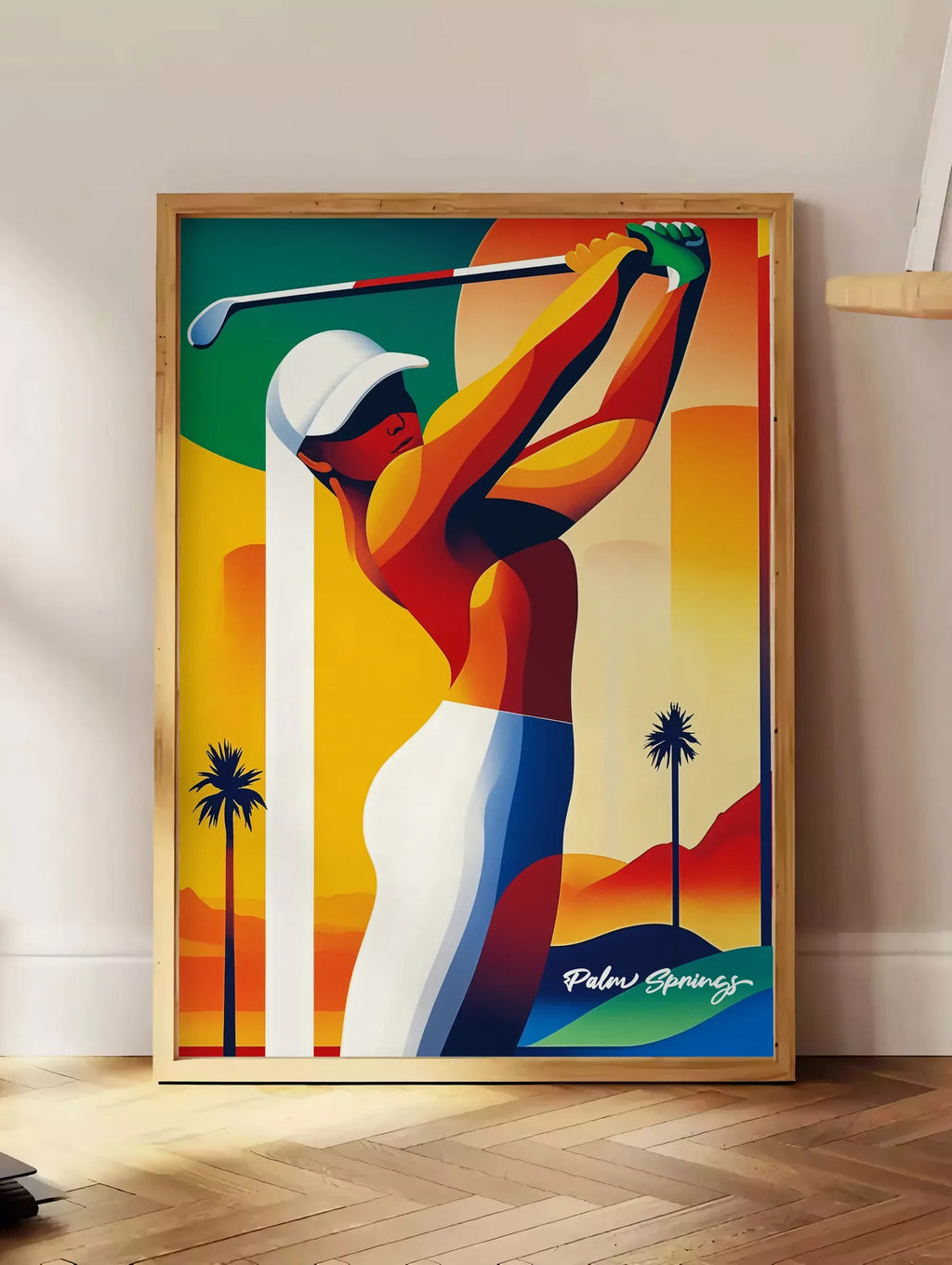 Estampe golfeuse stylisée effectue un swing, posee au sol dans un coin salon, sur un parquet a chevrons, pres d'une table d'appoint en chene chargee de livres