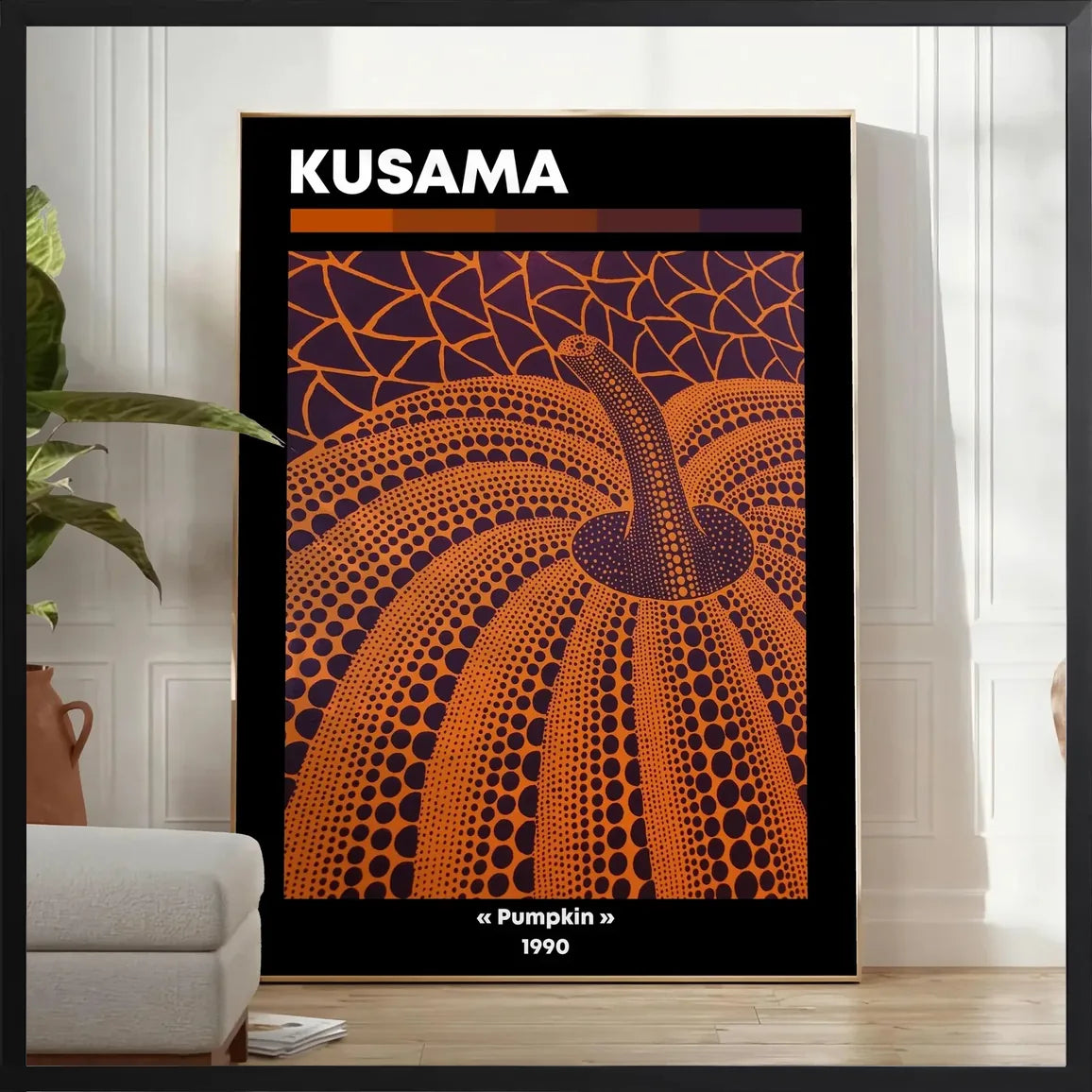 Encadrement noir mat autour de la citrouille a pois orange de Kusama