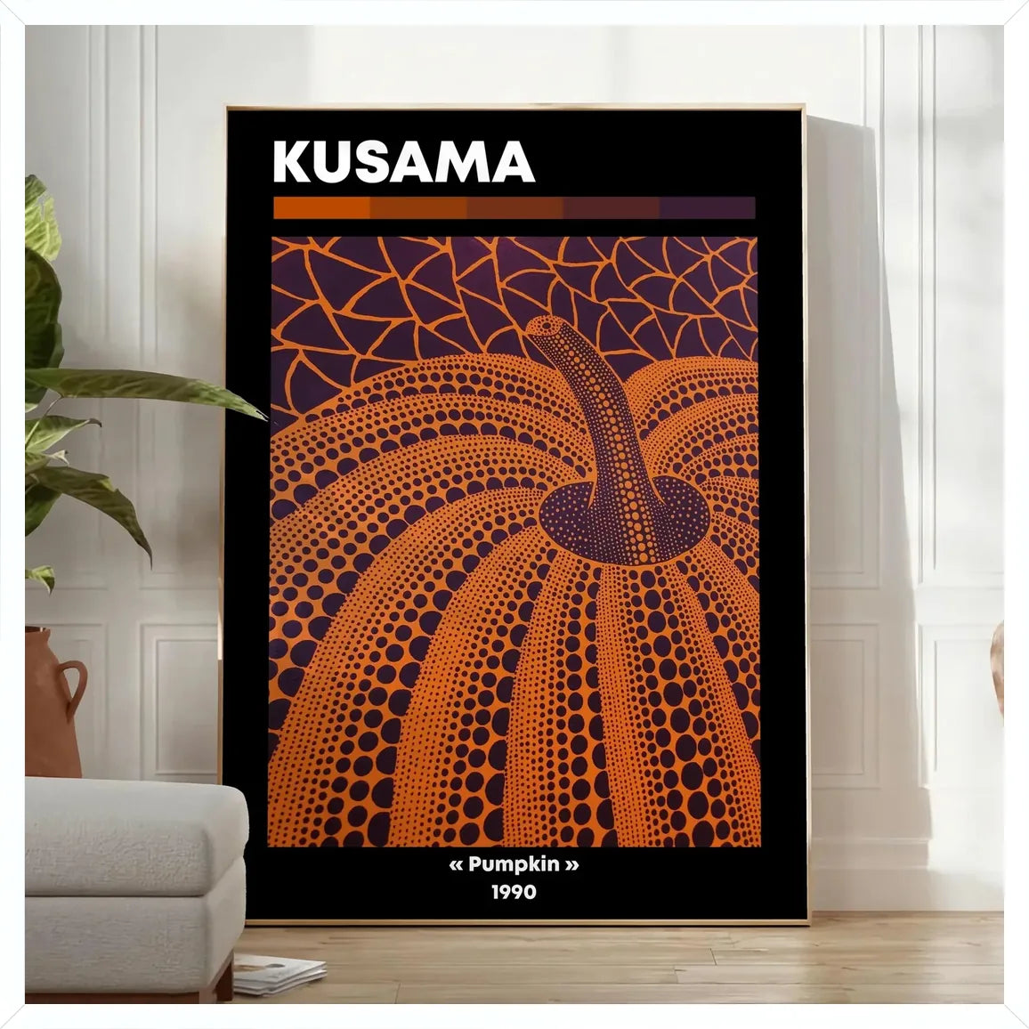 Cadre blanc epure presentant l'affiche Kusama citrouille orange