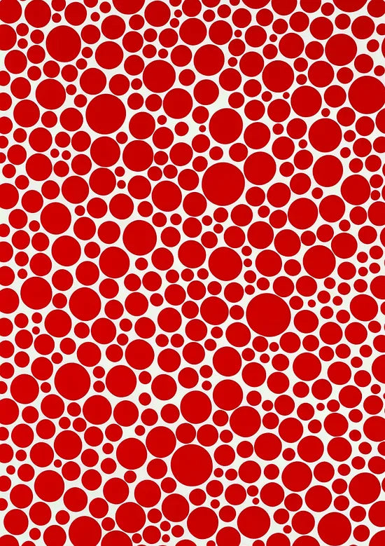Gros plan sur pois rouges de Kusama