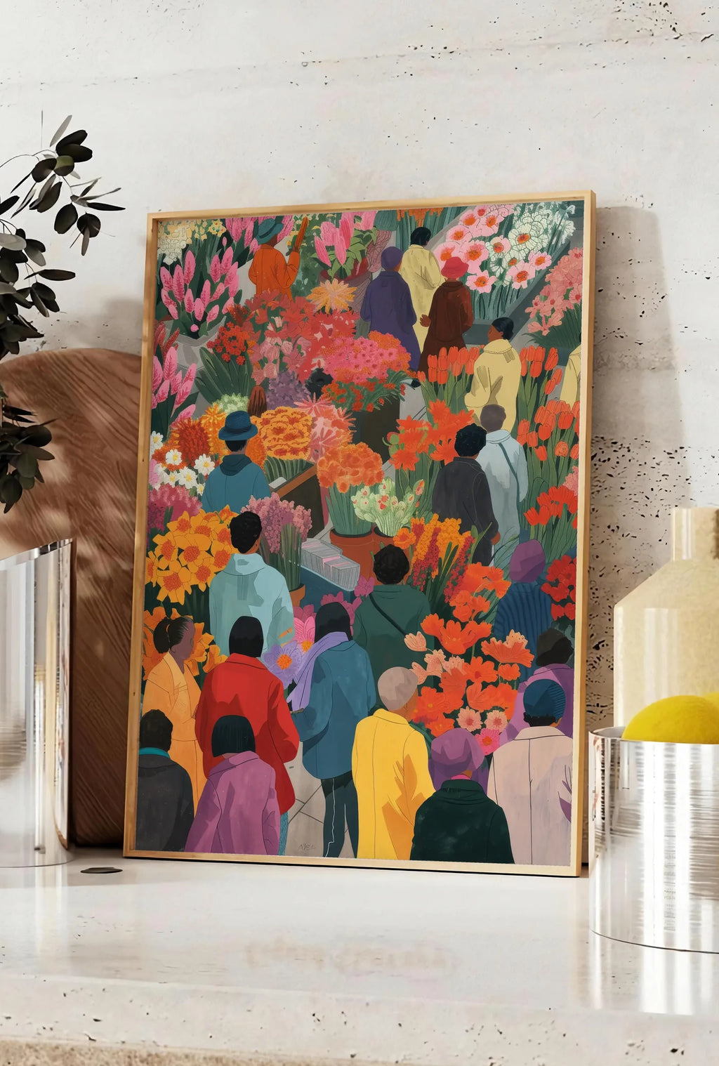 Affiche affiche marche aux fleurs colore art japonais, posee sur un plan de travail de cuisine en pierre claire, entre une branche d'eucalyptus en vase et un bocal de citrons