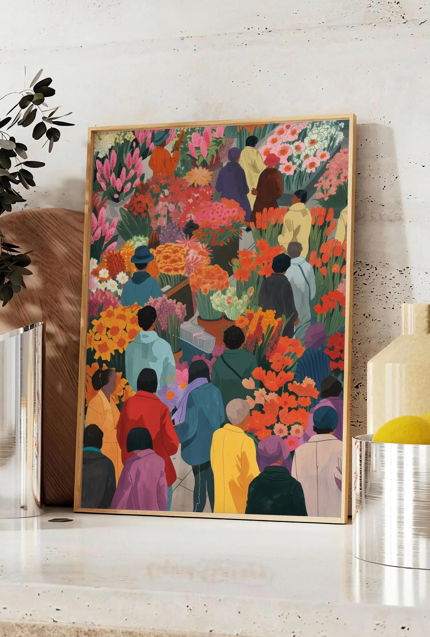 Affiche affiche marche aux fleurs colore art japonais, posee sur un plan de travail de cuisine en pierre claire, entre une branche d'eucalyptus en vase et un bocal de citrons