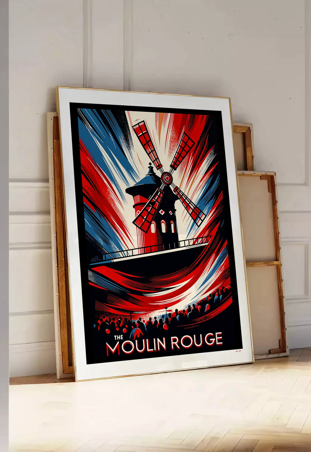 Tirage encadrable affiche Moulin Rouge Art Deco, posee au sol dans une entree lumineuse, contre un mur a panneaux blancs, a cote de chassis en bois empiles
