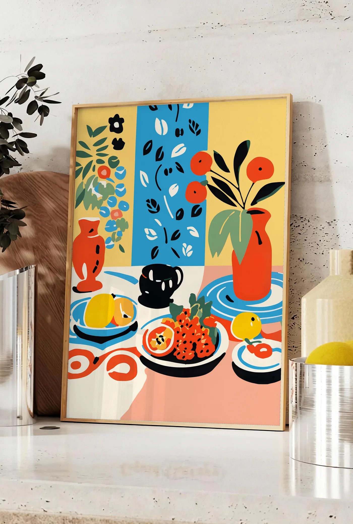 Affiche affiche cuisine nature morte, posee sur un plan de travail de cuisine en pierre claire, entre une branche d'eucalyptus en vase et un bocal de citrons