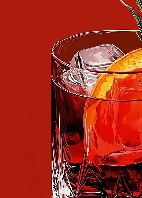 Gros plan sur le verre a negroni, zeste d'orange et romarin