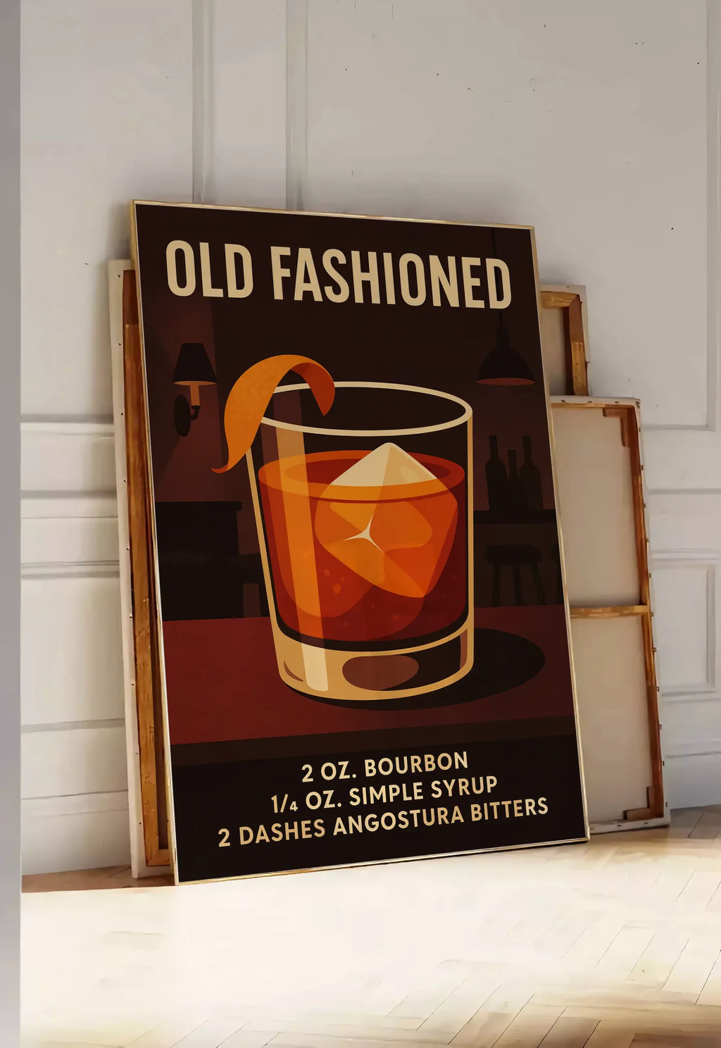 Tirage encadrable affiche cocktail Old Fashioned, posee au sol dans une entree lumineuse, contre un mur a panneaux blancs, a cote de chassis en bois empiles