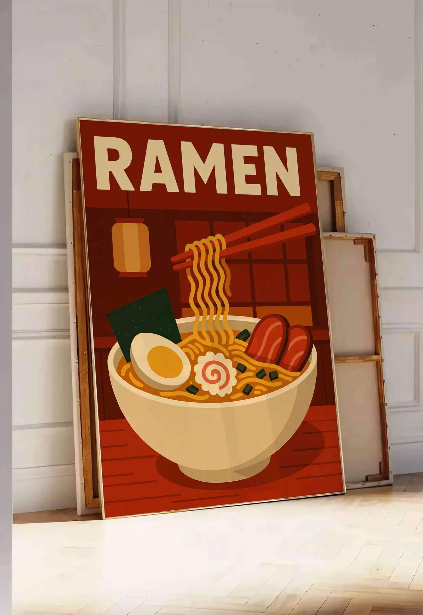 Tirage encadrable affiche ramen bol et nouilles soulevees a la baguette dans une cuisine rouge brique, posee au sol dans une entree lumineuse, contre un mur a panneaux blancs, a cote de chassis en bois empiles