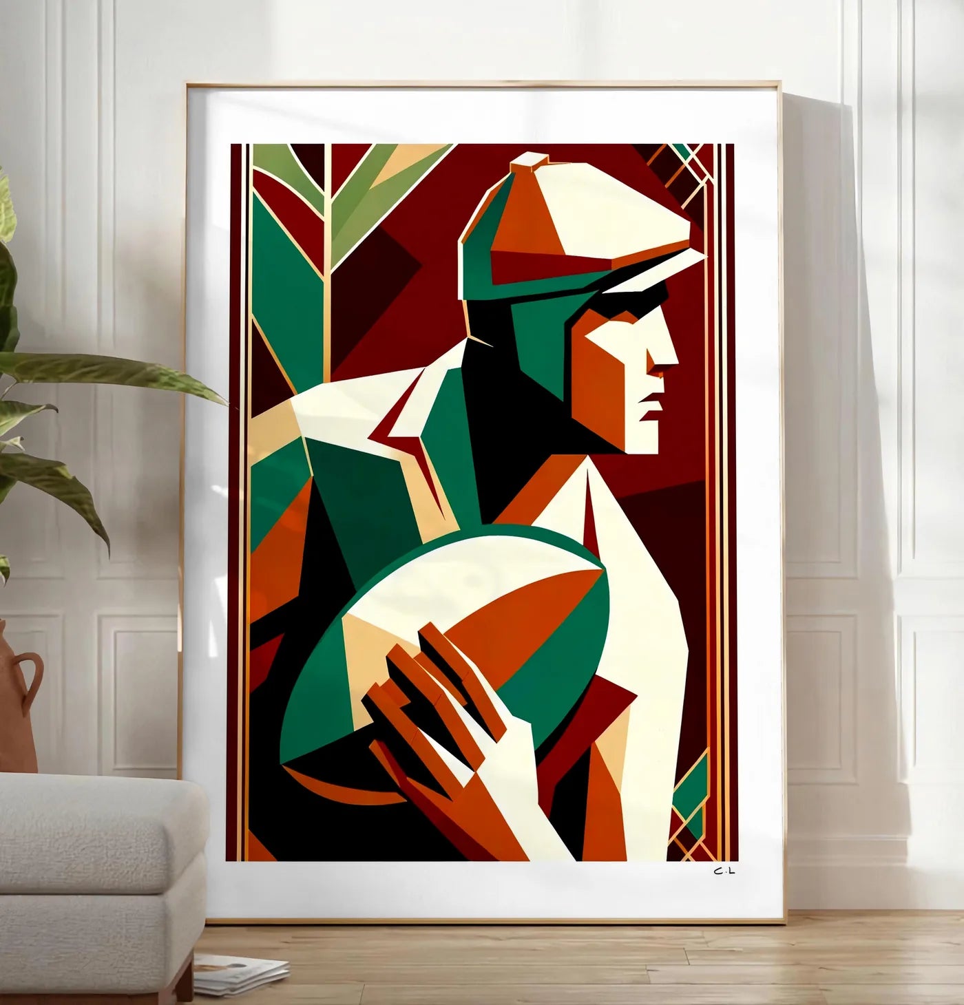 Reproduction affiche rugby art deco, posee au sol dans un salon minimaliste clair, a cote d'un canape beige et d'une plante verte, sur un parquet clair