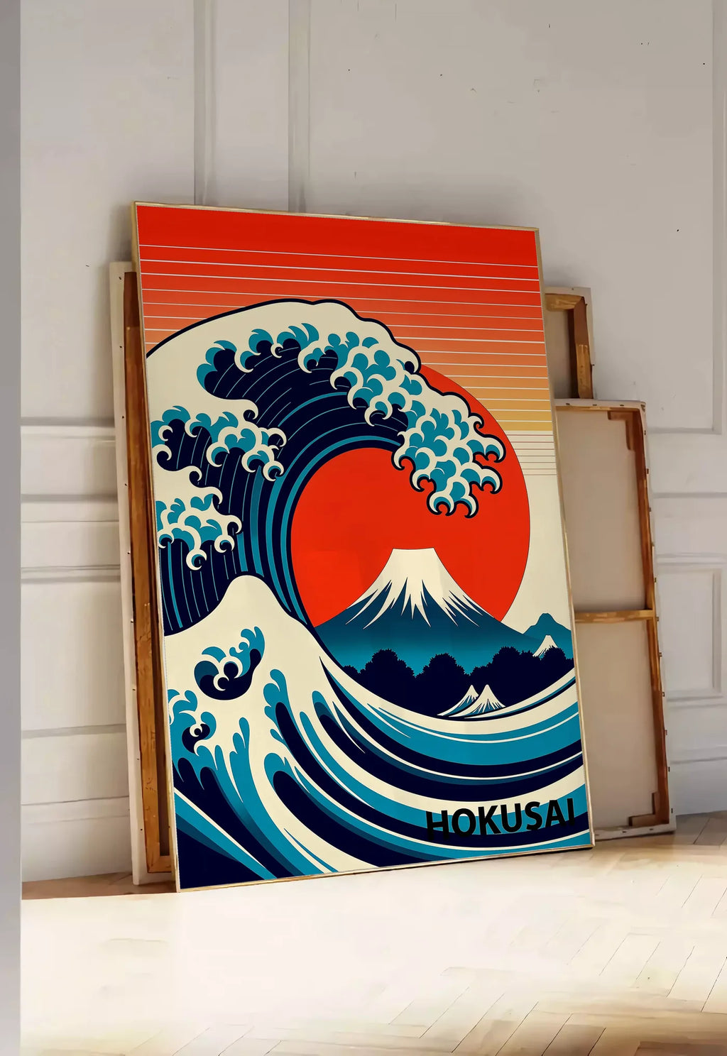 Tirage encadrable affiche grande vague pop art, posee au sol dans une entree lumineuse, contre un mur a panneaux blancs, a cote de chassis en bois empiles