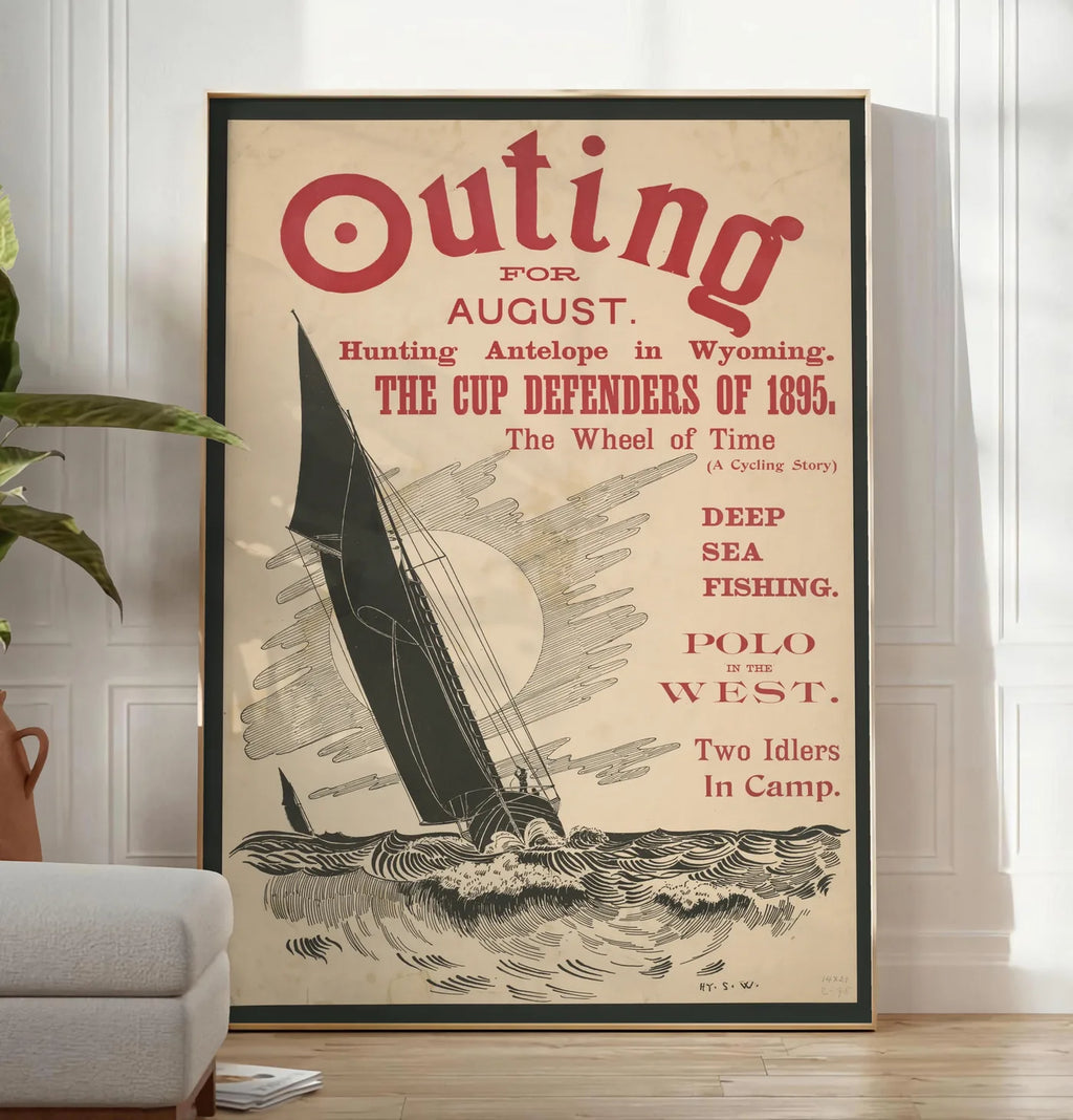 Reproduction affiche Outing vintage, posee au sol dans un salon minimaliste clair, a cote d'un canape beige et d'une plante verte, sur un parquet clair