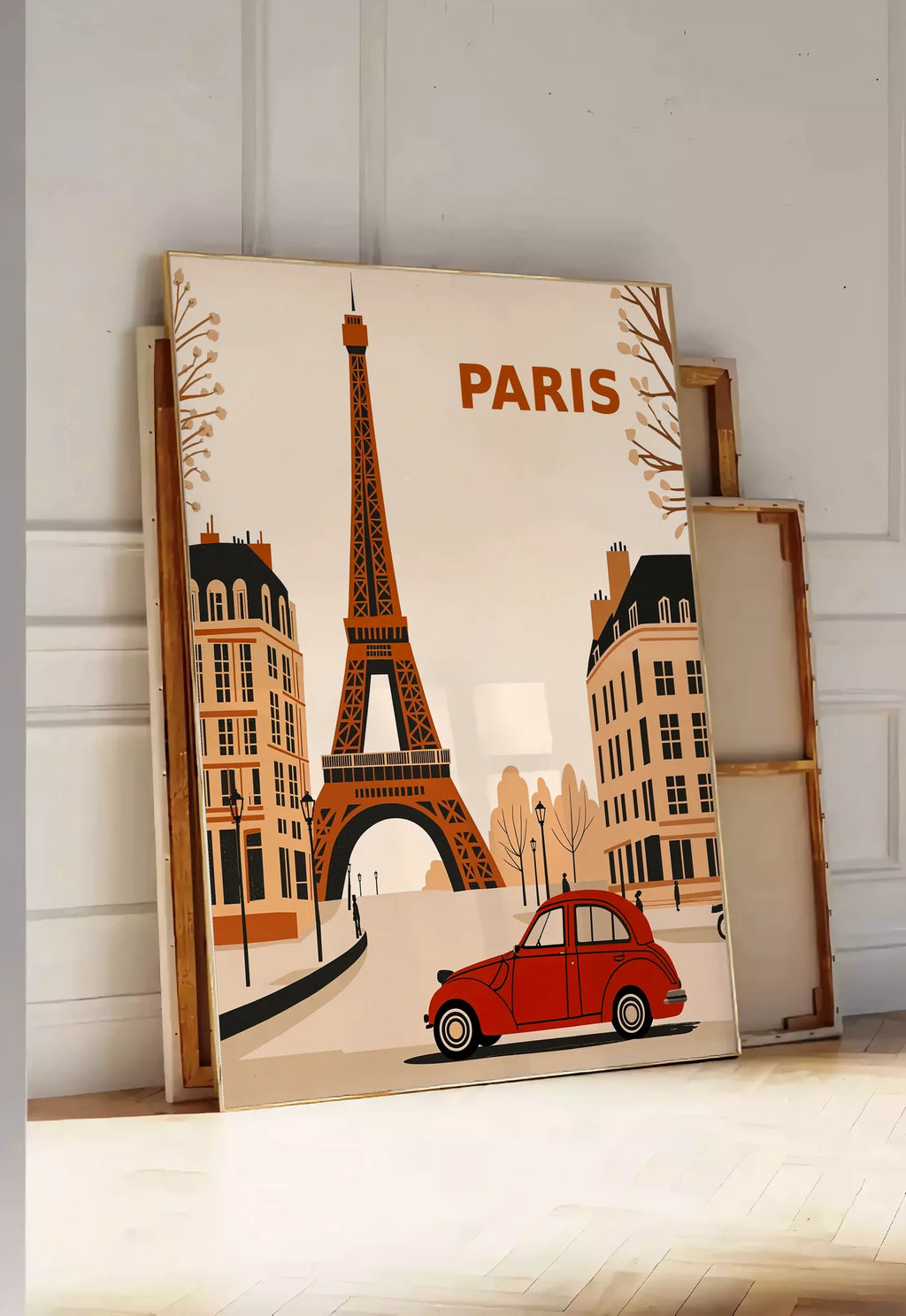 Tirage encadrable affiche Paris vintage, posee au sol dans une entree lumineuse, contre un mur a panneaux blancs, a cote de chassis en bois empiles